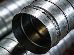 螺旋风管在工业环保中的应用：粉尘与废气的高效排放方案